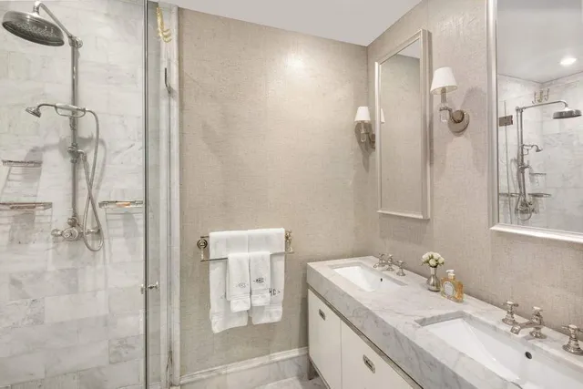 a bathroom with a sink and mirror