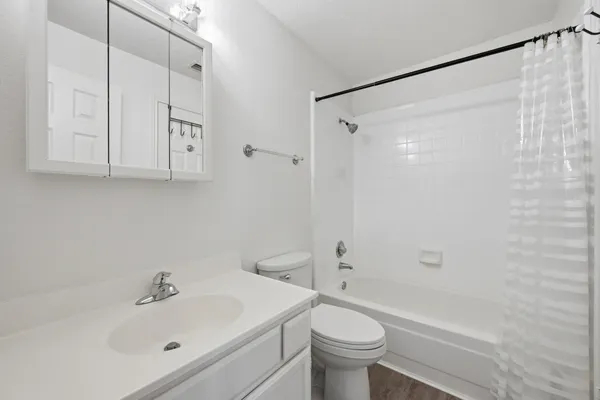 a front view of a house with brick walls