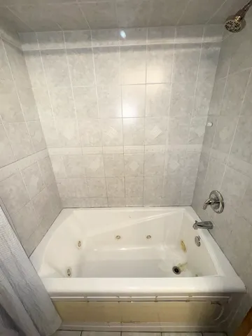a bathroom with a bathtub
