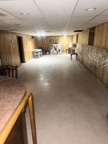 a view of a livingroom with furniture and garage