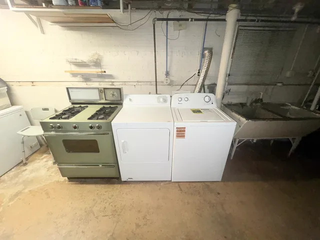 a kitchen with a stove and a refrigerator
