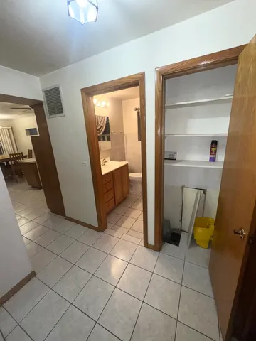 a view of a storage & utility room in a house