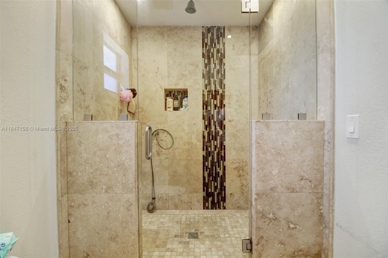 9755 Southwest 161st Street Miami, FL 33157 - Photo 21 of 32 a bathroom with a shower
