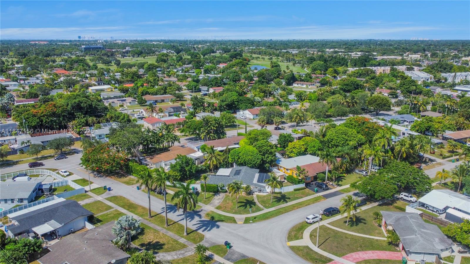 9755 Southwest 161st Street Miami, FL 33157 - Photo 32 of 32 an aerial view of residential house with outdoor space and trees all around