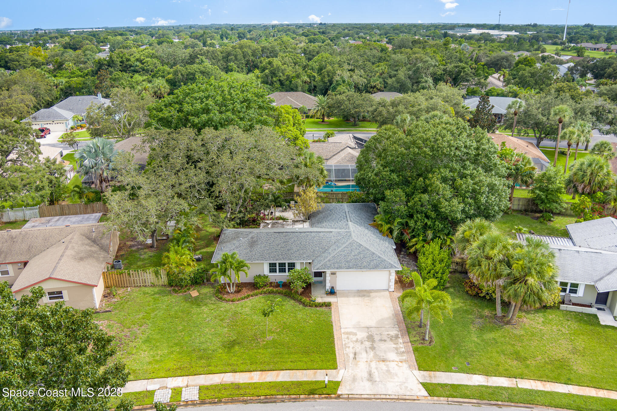 2842 Watkins Drive Melbourne, FL 32901 - Photo 32 of 39 an aerial view of a house with a yard