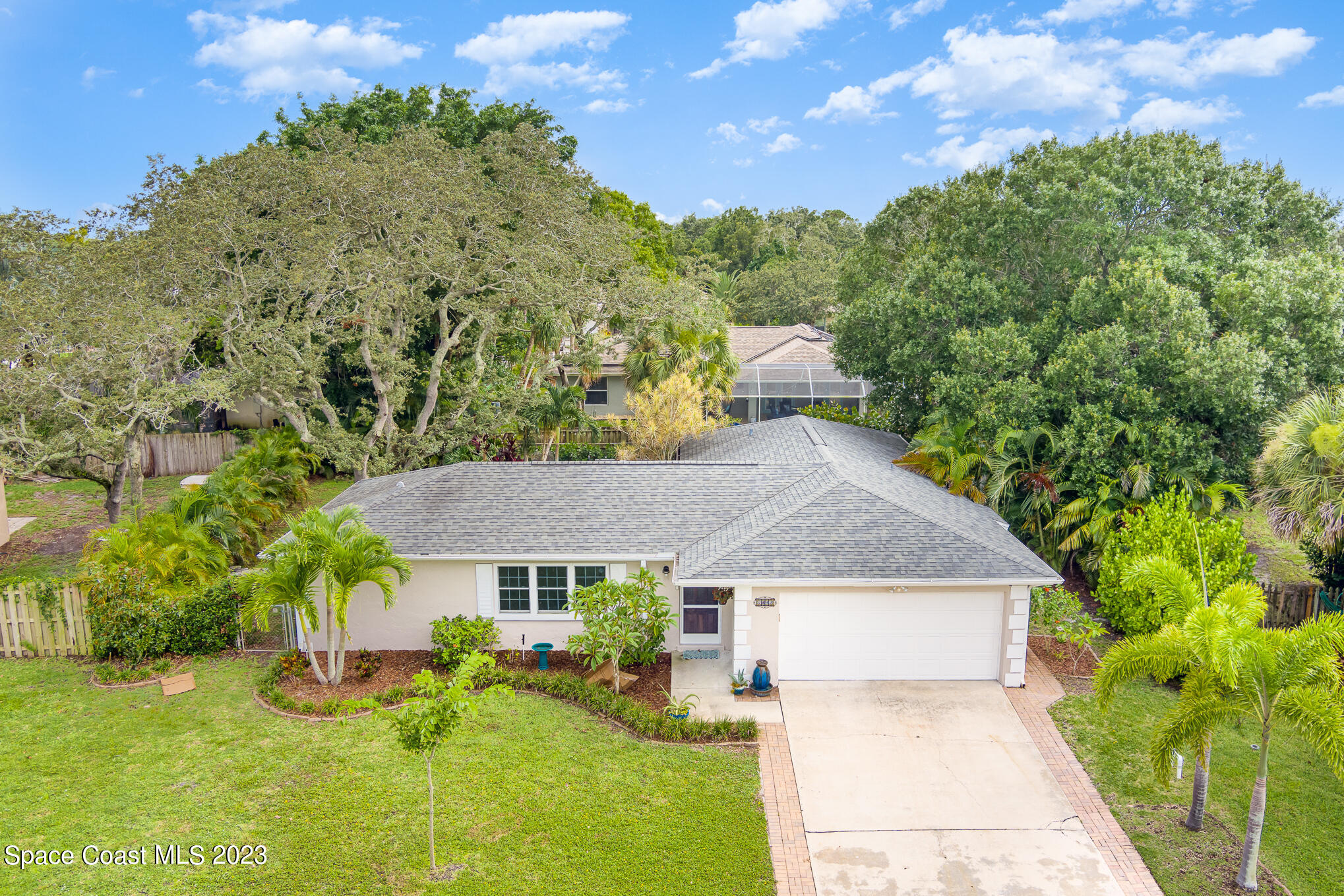 2842 Watkins Drive Melbourne, FL 32901 - Photo 34 of 39 front view of a house with a yard