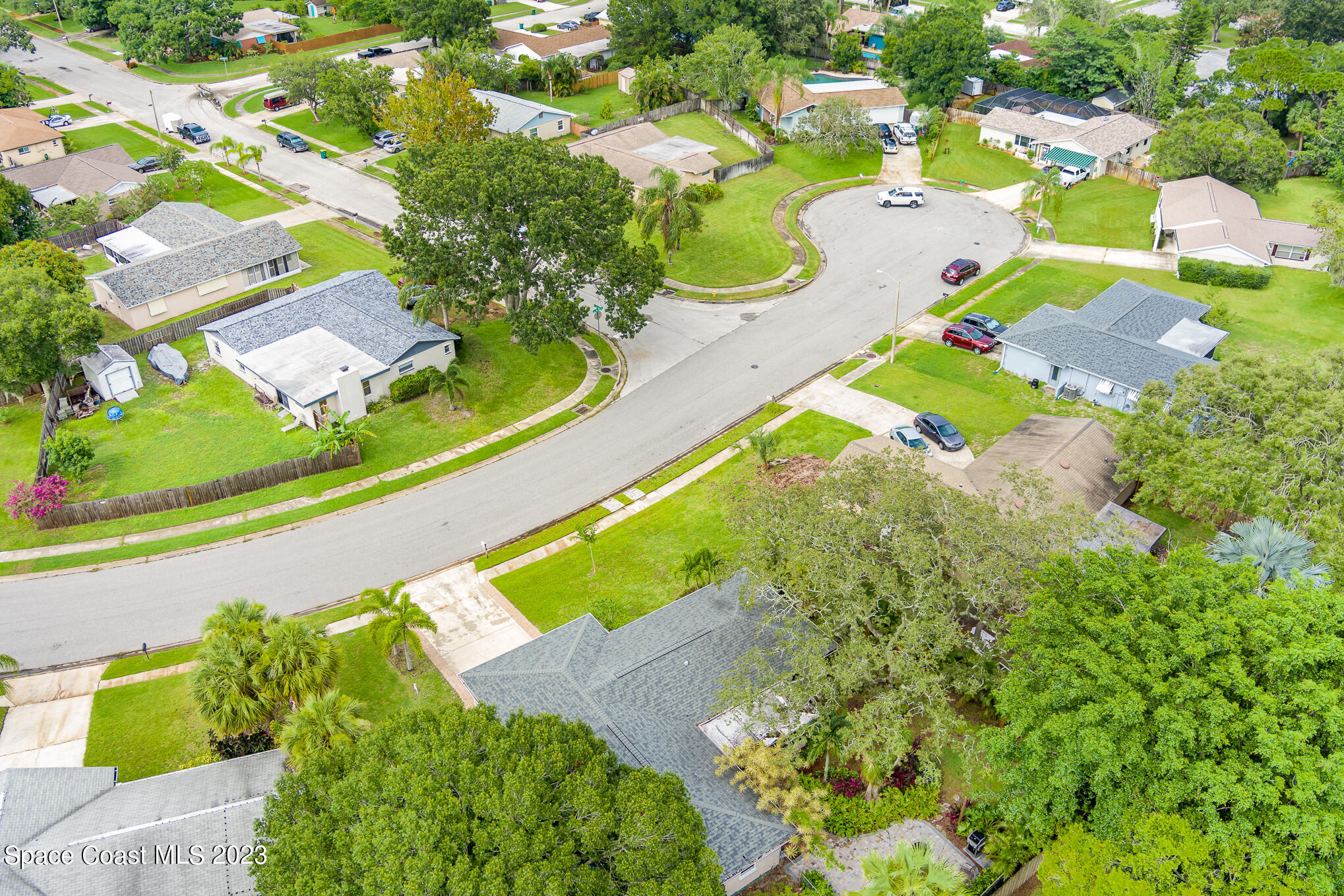 2842 Watkins Drive Melbourne, FL 32901 - Photo 35 of 39 a view of yard and swimming pool