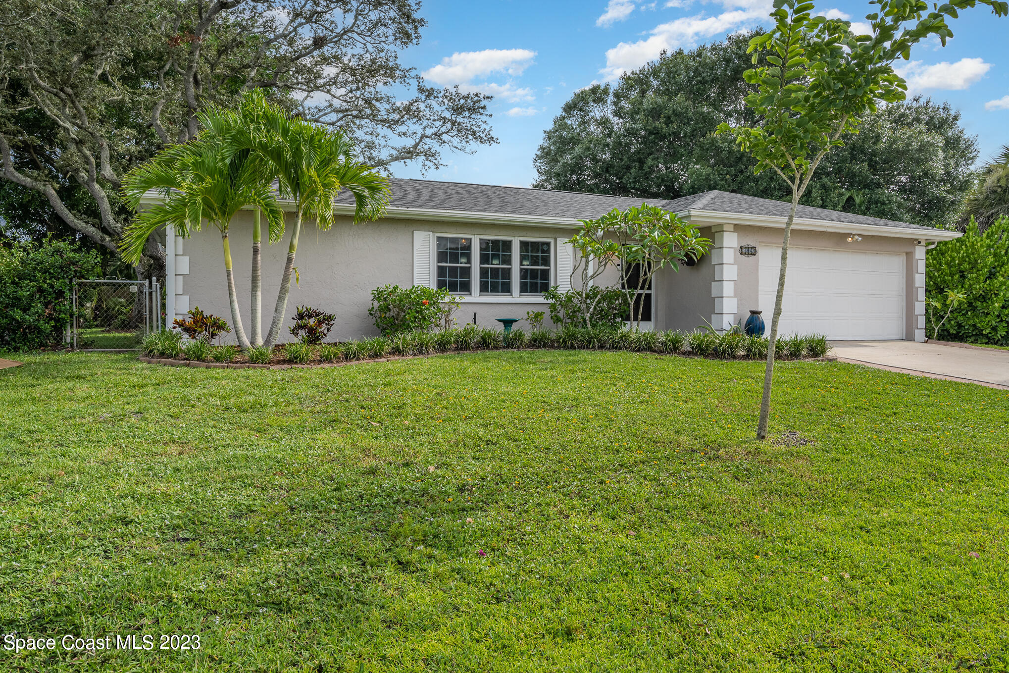 2842 Watkins Drive Melbourne, FL 32901 - Photo 37 of 39 a house view with a garden space