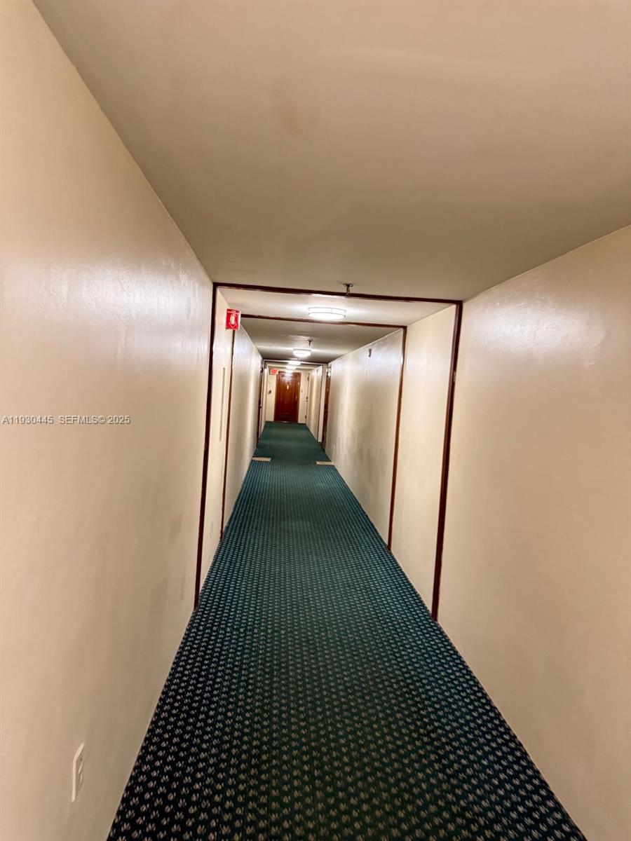 671 Northeast 195th Street, Unit 121E Miami, FL 33179 - Photo 12 of 39 a view of entryway
