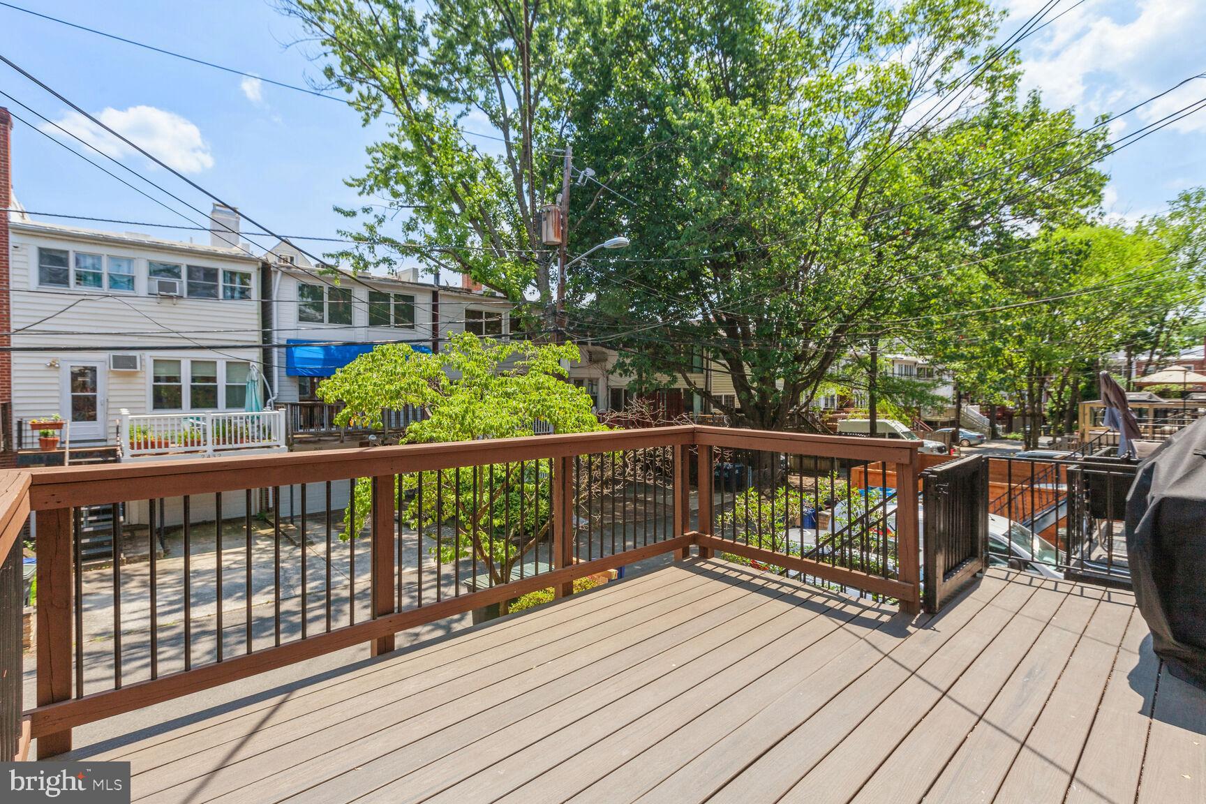 2433 39th Place Northwest Washington, DC 20007 - Photo 10 of 29 Deck Off Main Level Extends Your Living Space