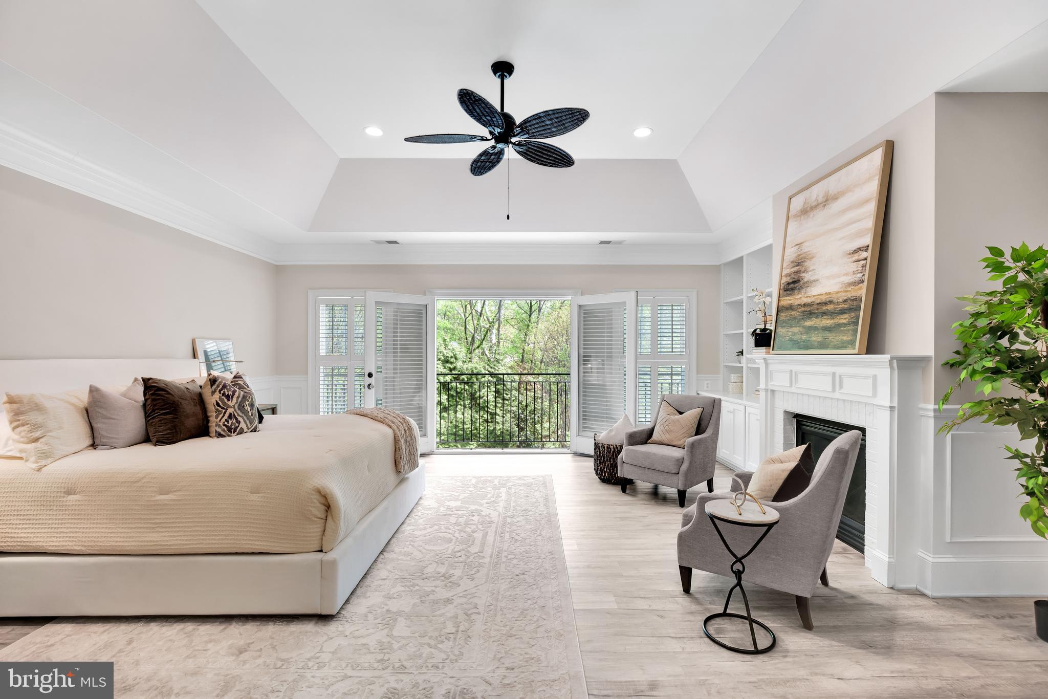 6525 Kenhill Road Bethesda, MD 20817 - Photo 21 of 45 Primary suite with gas fire place and tray ceiling