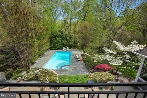 a view of a yard with an outdoor seating