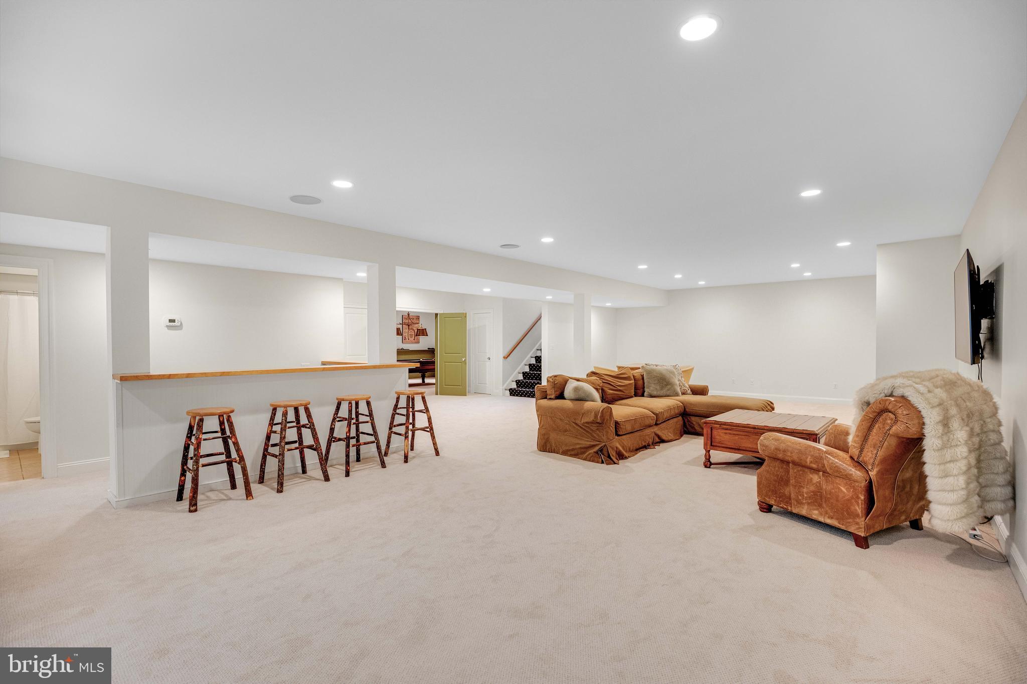 6525 Kenhill Road Bethesda, MD 20817 - Photo 33 of 45 Rec Room on lower level with bar area