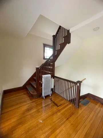 a view of entryway with wooden floor