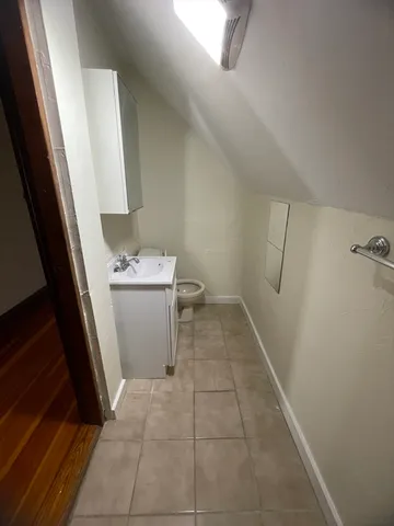 a utility room with a sink a washer and dryer