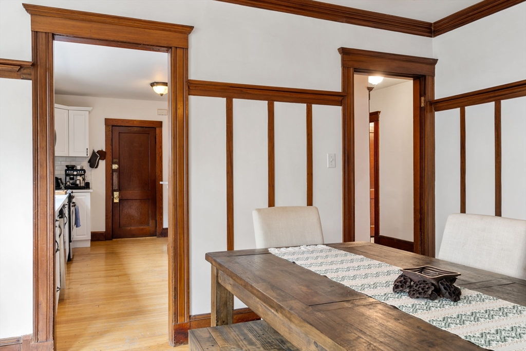 18 Park Road, Unit 1 Belmont, MA 02478 - Photo 14 of 36 a living room with a bed furniture and a window