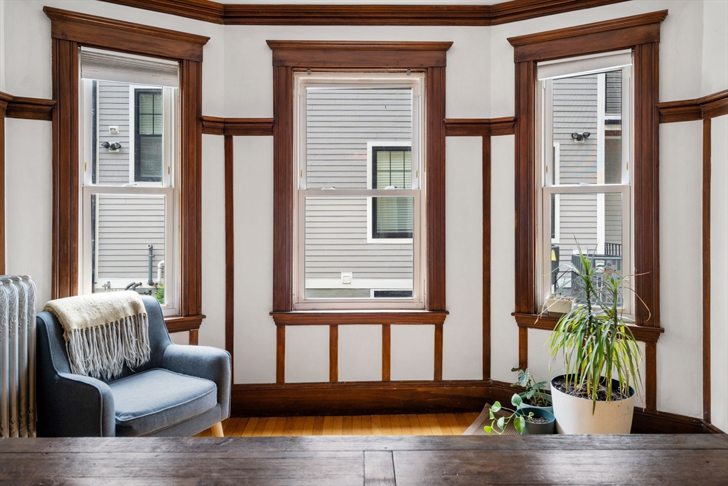 18 Park Road, Unit 1 Belmont, MA 02478 - Photo 21 of 36 a living room with furniture and a window