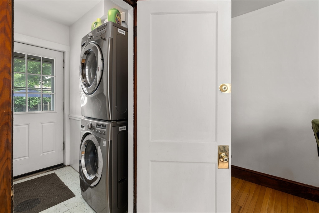 18 Park Road, Unit 1 Belmont, MA 02478 - Photo 22 of 36 a utility room with dryer and washer