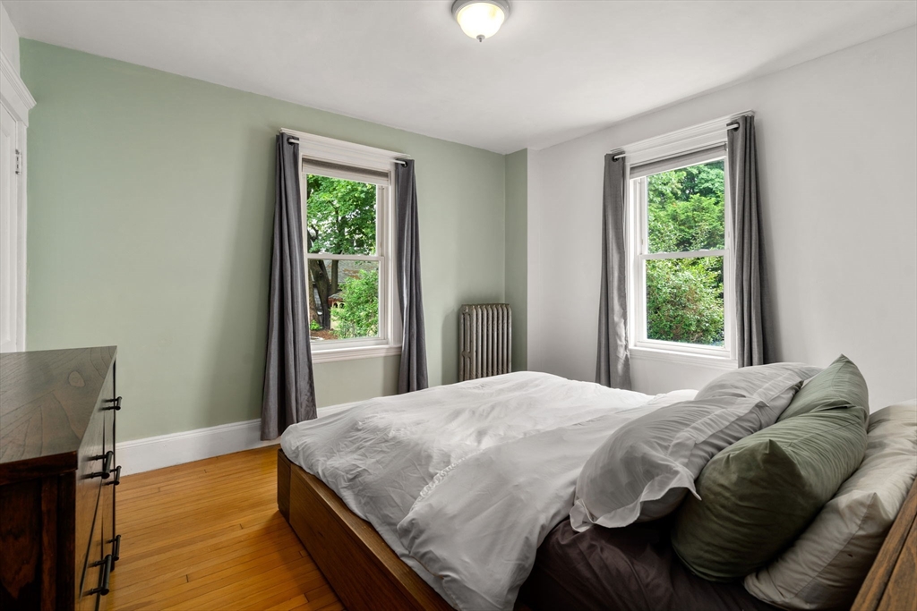 18 Park Road, Unit 1 Belmont, MA 02478 - Photo 26 of 36 a bedroom with a bed and window