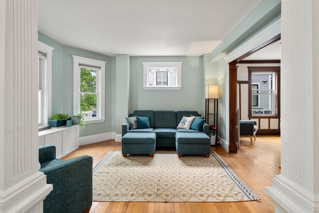 18 Park Road, Unit 1 Belmont, MA 02478 - Photo 5 of 36 a living room with furniture and a couch