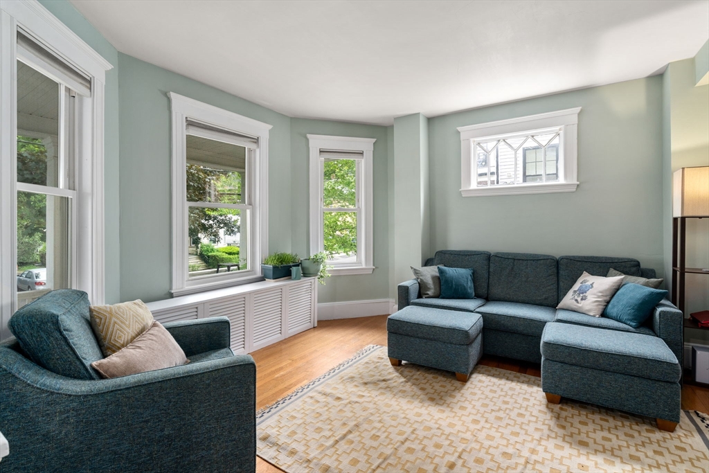 18 Park Road, Unit 1 Belmont, MA 02478 - Photo 6 of 36 a living room with furniture and a window