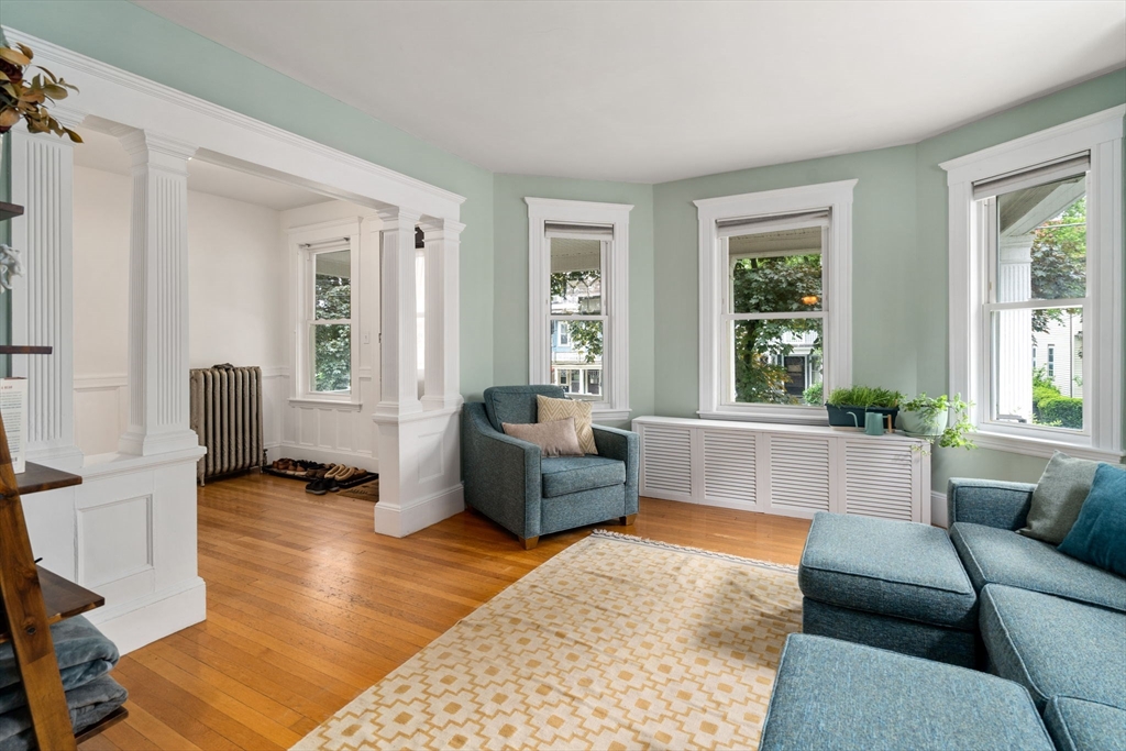 18 Park Road, Unit 1 Belmont, MA 02478 - Photo 7 of 36 a living room with furniture and a large window