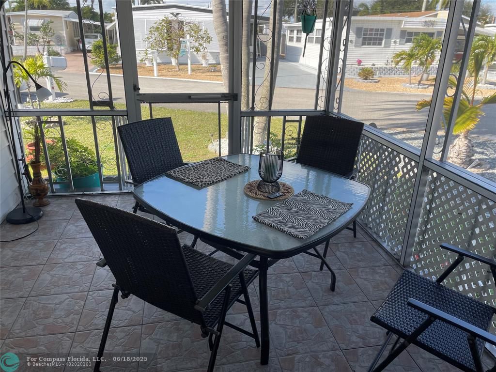 8610 Southwest 18th Court Davie, FL 33324 - Photo 13 of 17 a view of a outdoor seating area with furniture