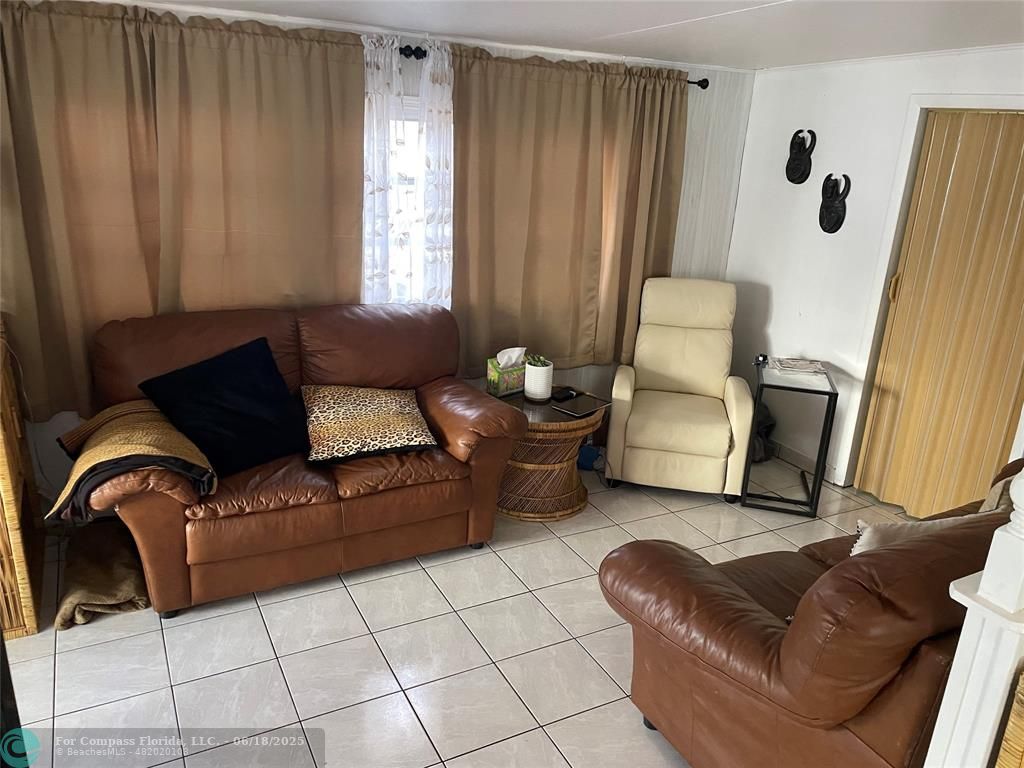 8610 Southwest 18th Court Davie, FL 33324 - Photo 4 of 17 a living room with furniture and a window