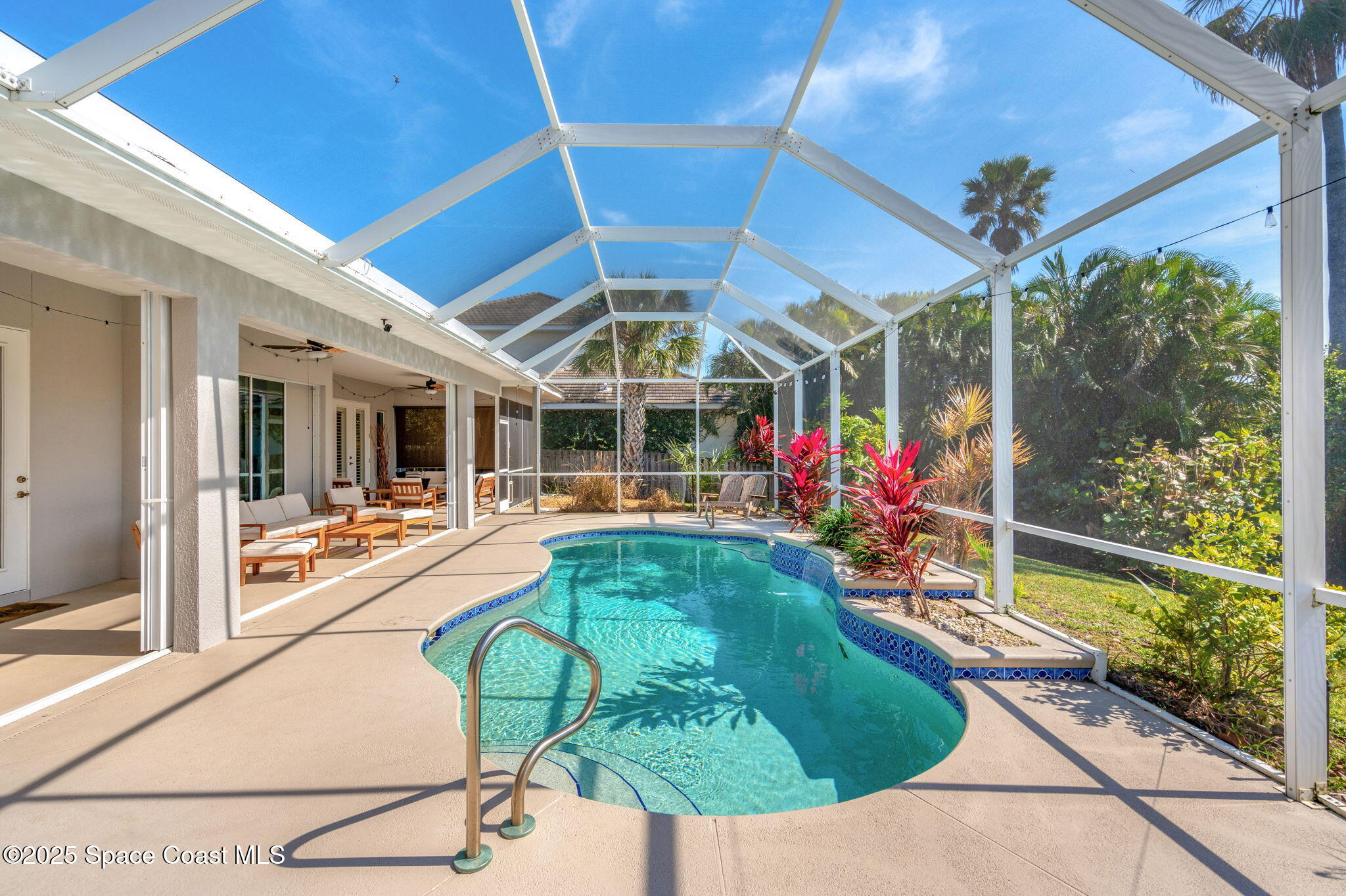231 Loggerhead Drive Melbourne Beach, FL 32951 - Photo 23 of 47 a view of a backyard with porch and patio