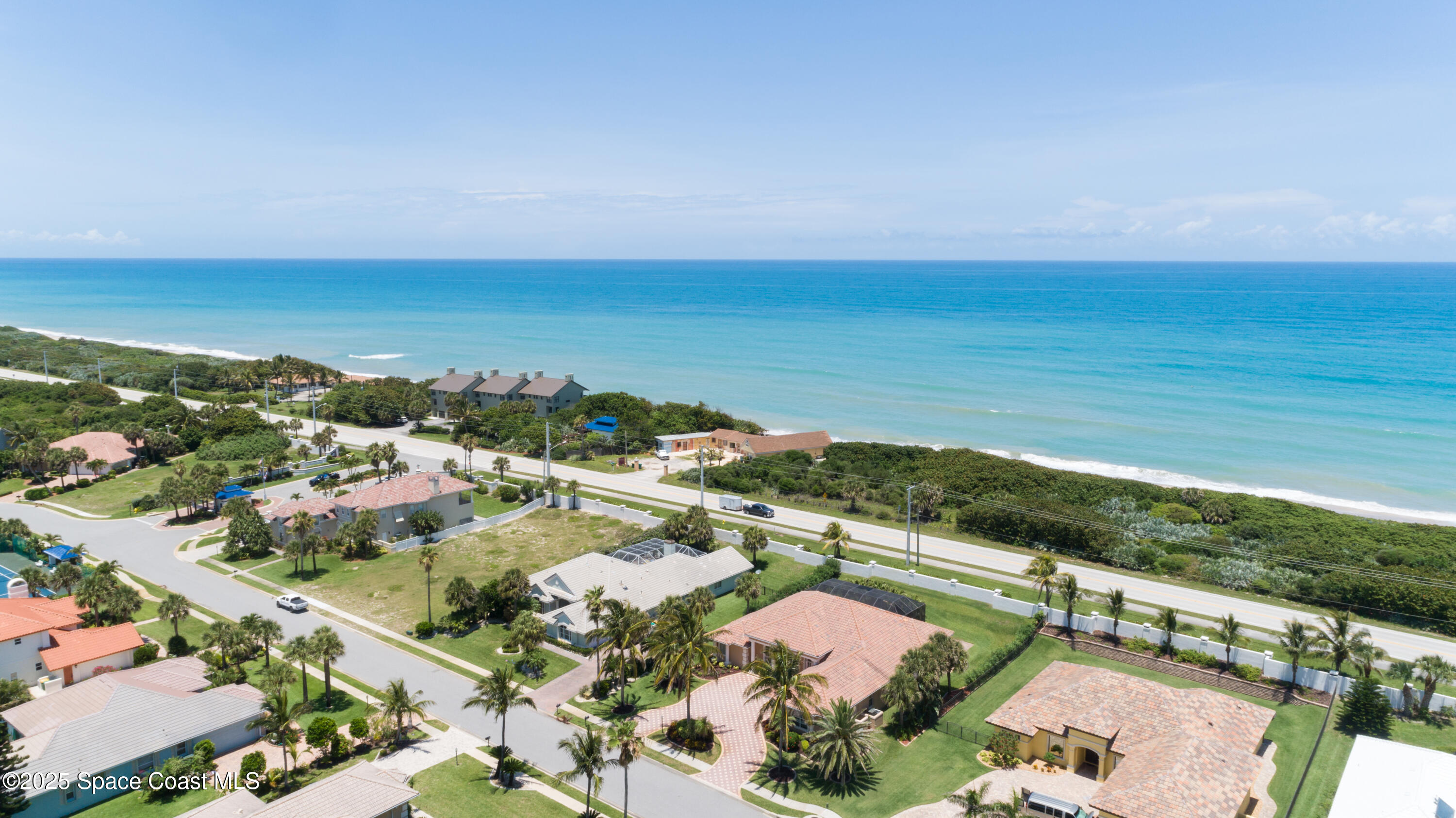 231 Loggerhead Drive Melbourne Beach, FL 32951 - Photo 42 of 47 an aerial view of ocean and residential houses with outdoor space