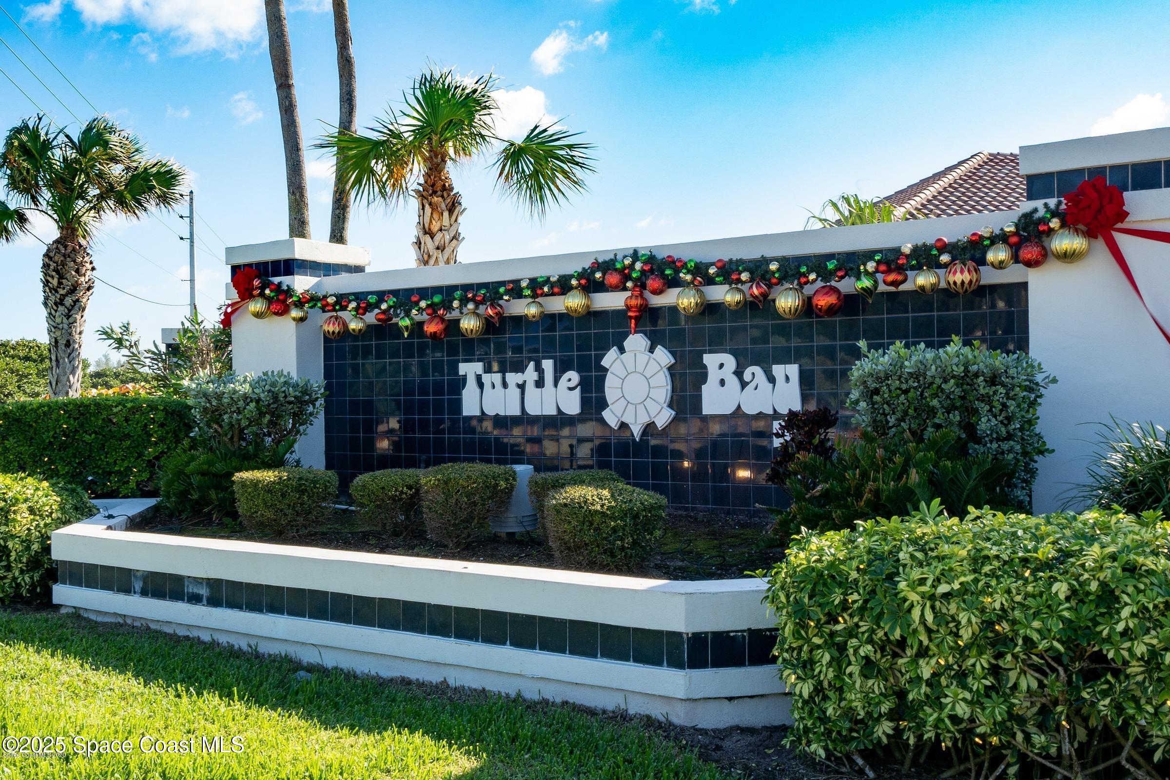 231 Loggerhead Drive Melbourne Beach, FL 32951 - Photo 46 of 47 a view of swimming pool with a table and chairs potted plants