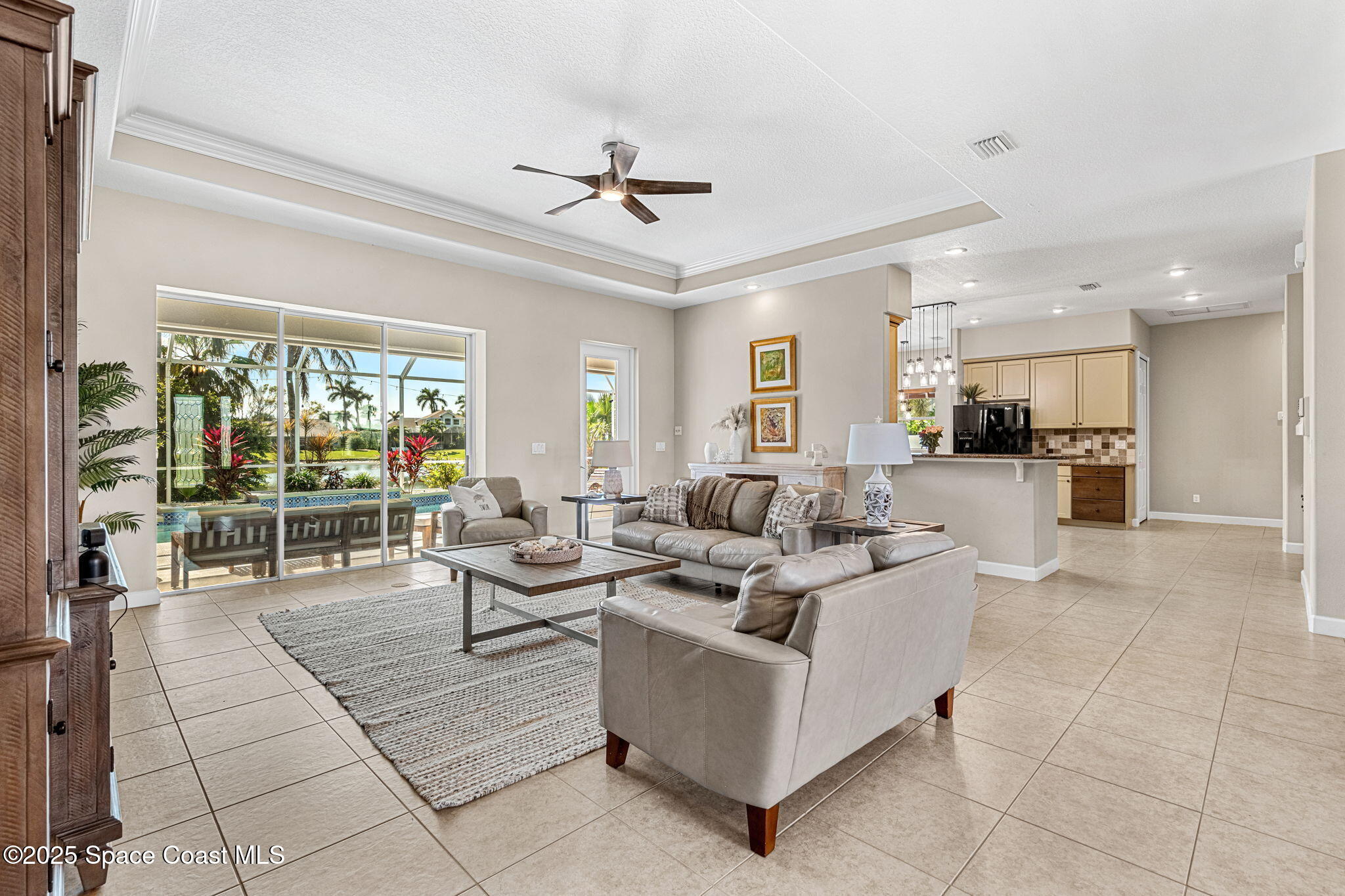 231 Loggerhead Drive Melbourne Beach, FL 32951 - Photo 6 of 47 a living room with furniture and a large window