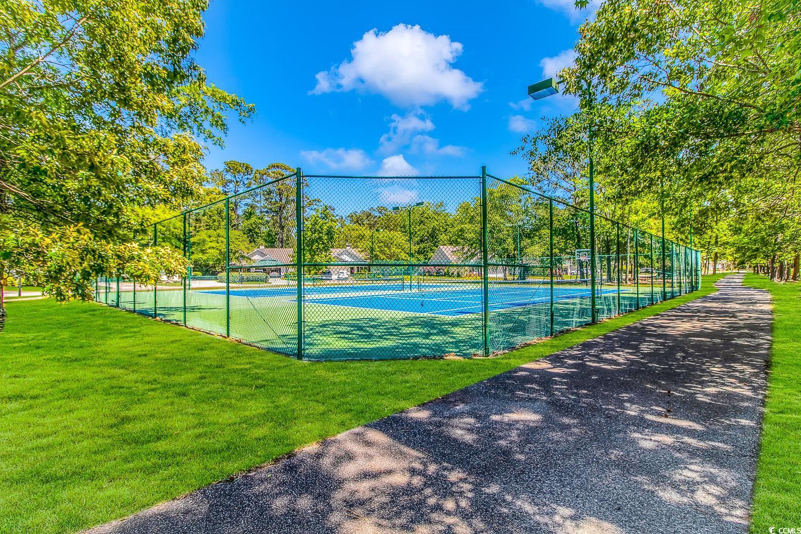 4460 Maypop Trail Murrells Inlet, SC 29576 - Photo 40 of 40 View of tennis court with a yard
