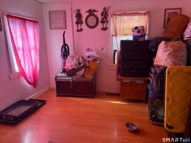 a room with furniture and window