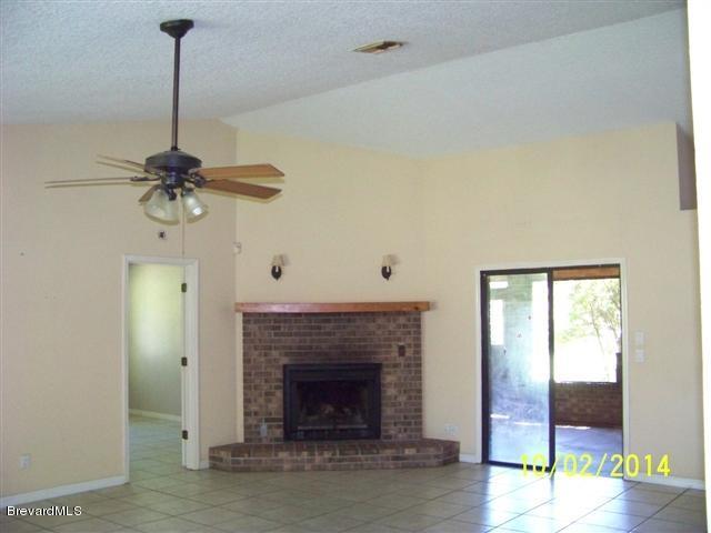 3435 Grant Road Grant, FL 32949 - Photo 7 of 17 fireplace