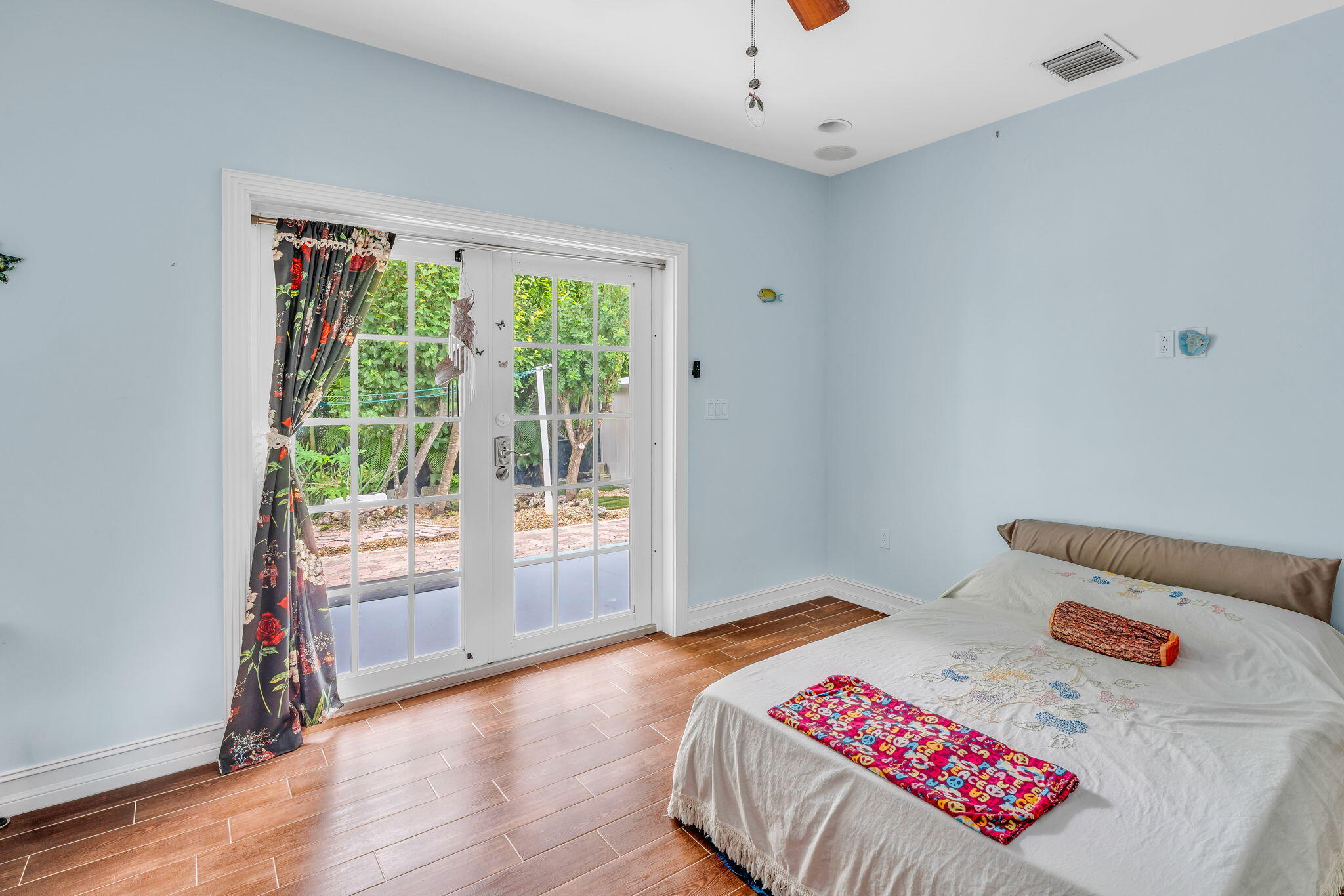 460 Lime Drive Key Largo, FL 33037 - Photo 17 of 49 a bedroom with a bed and a window