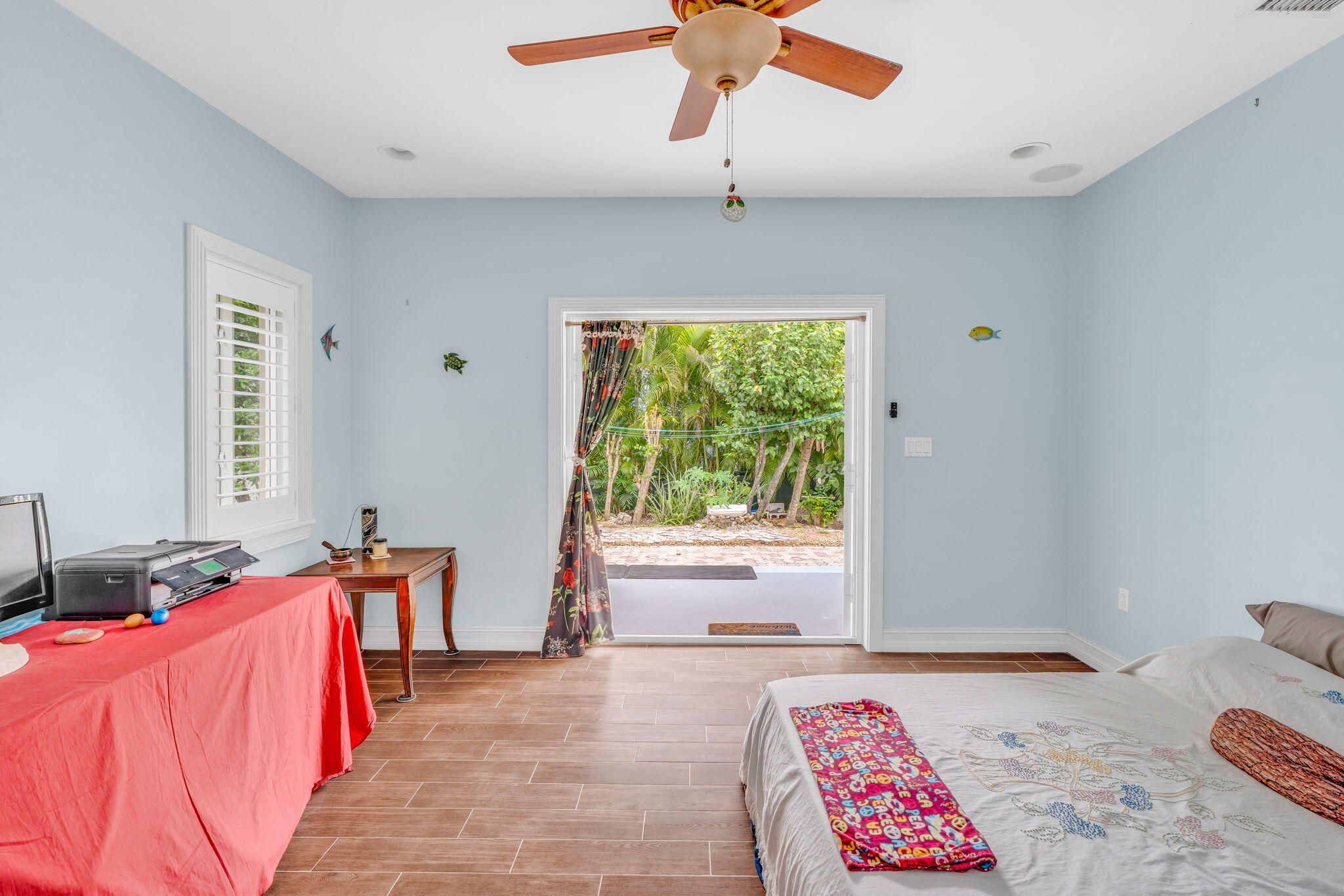 460 Lime Drive Key Largo, FL 33037 - Photo 19 of 49 a bedroom with furniture and a large window