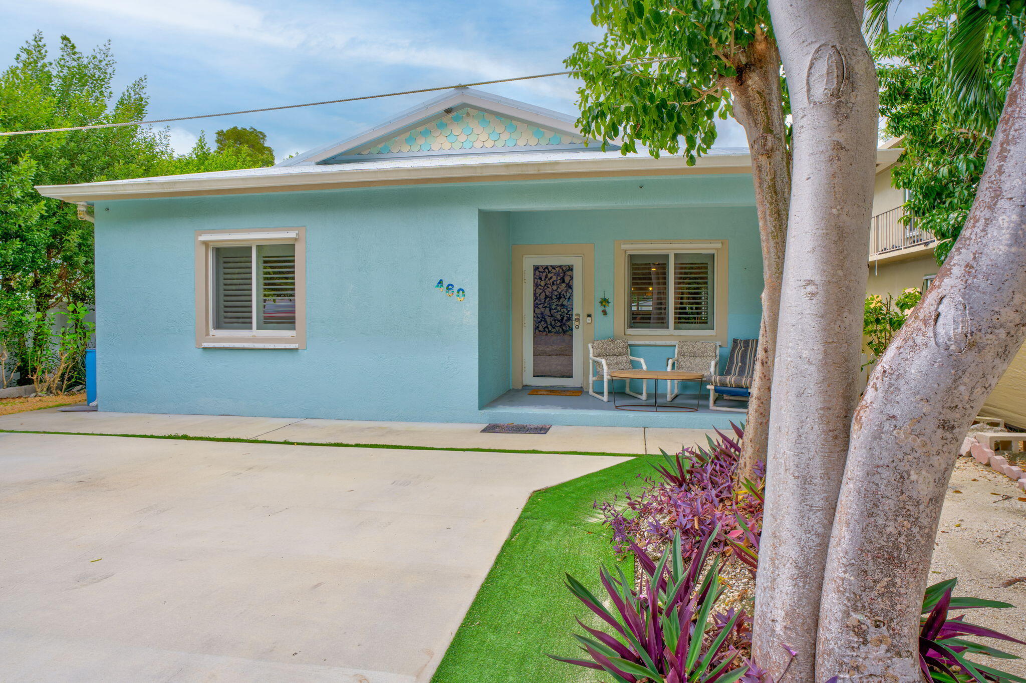 460 Lime Drive Key Largo, FL 33037 - Photo 32 of 49 a view of a house with a yard