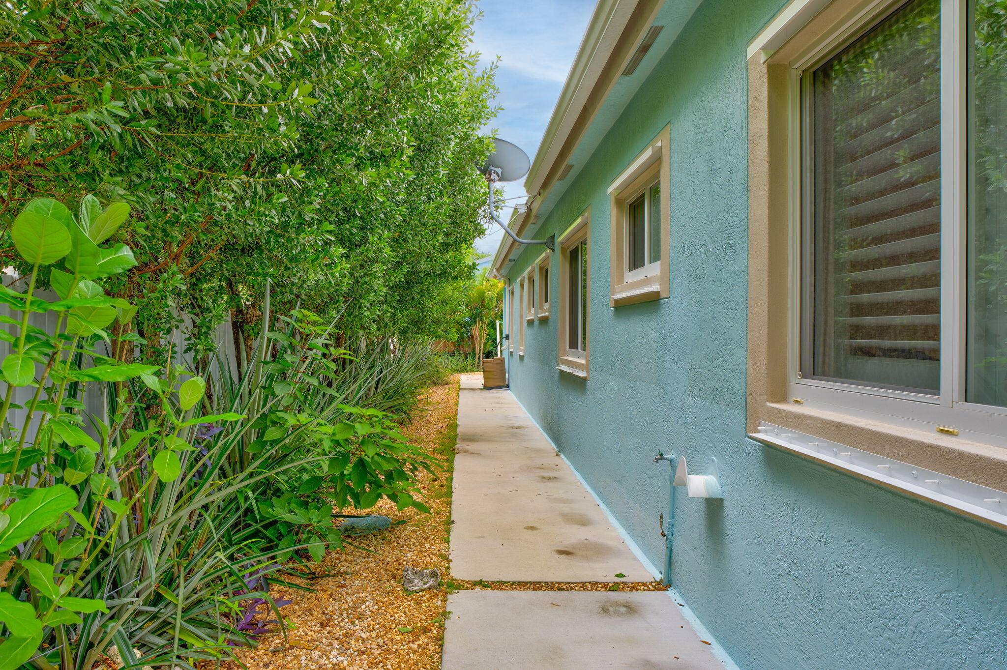 460 Lime Drive Key Largo, FL 33037 - Photo 33 of 49 a view of a pathway both side of house