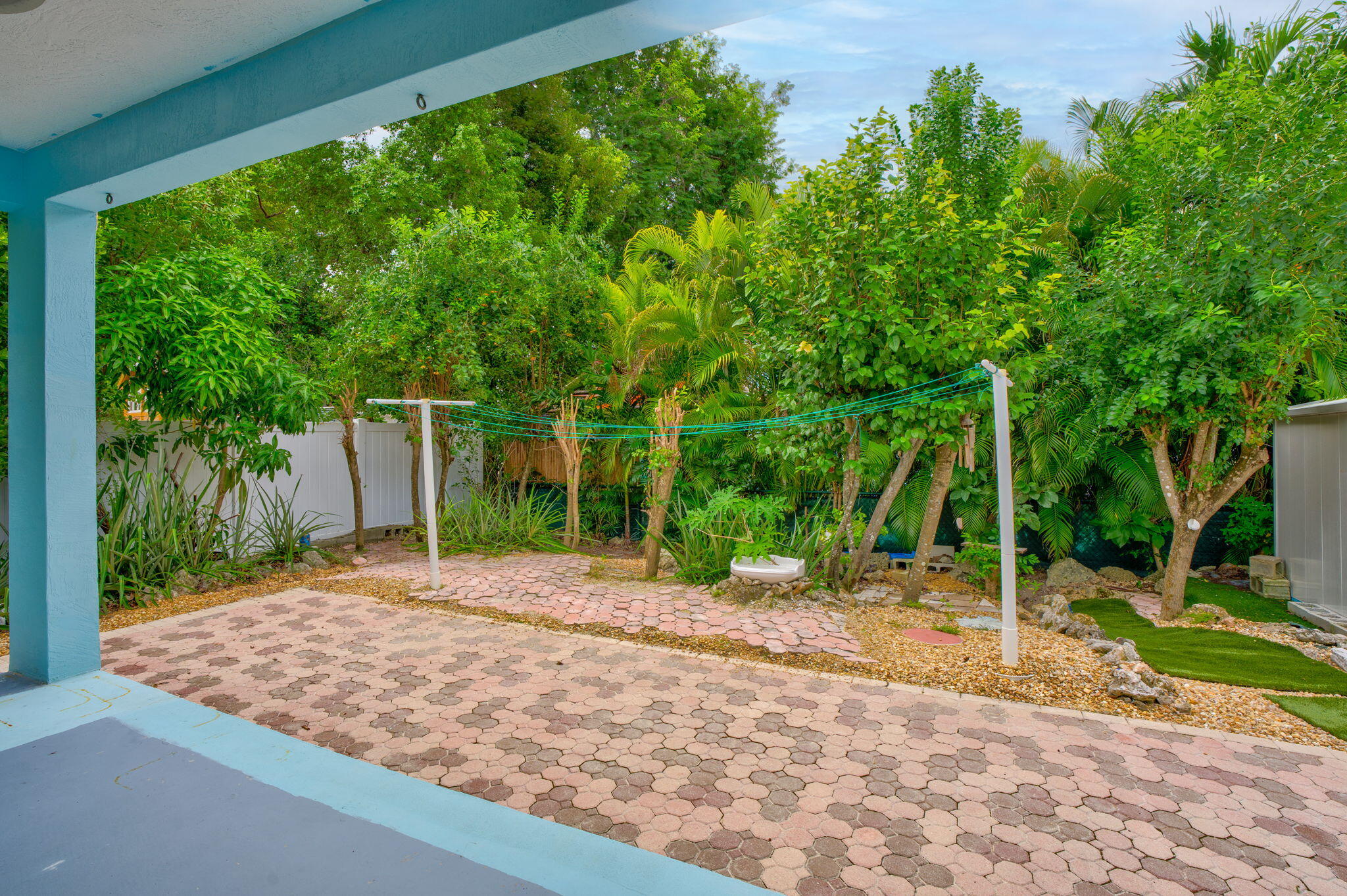 460 Lime Drive Key Largo, FL 33037 - Photo 36 of 49 a backyard of a house with lots of green space