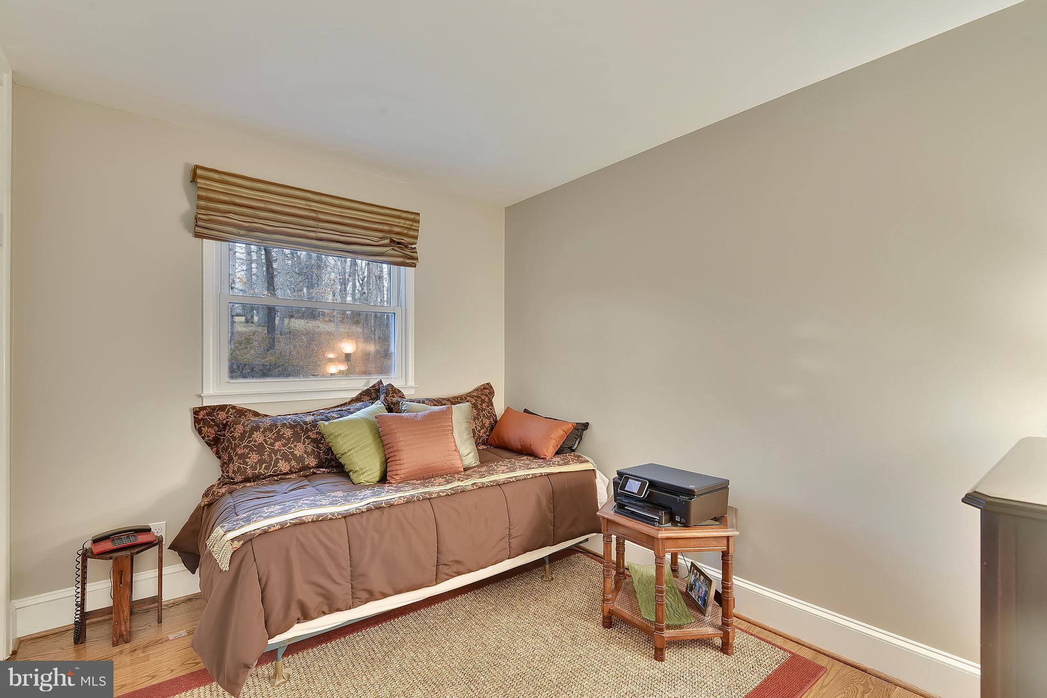 8108 Ellet Road Springfield, VA 22151 - Photo 11 of 21 a bedroom with a bed and a window