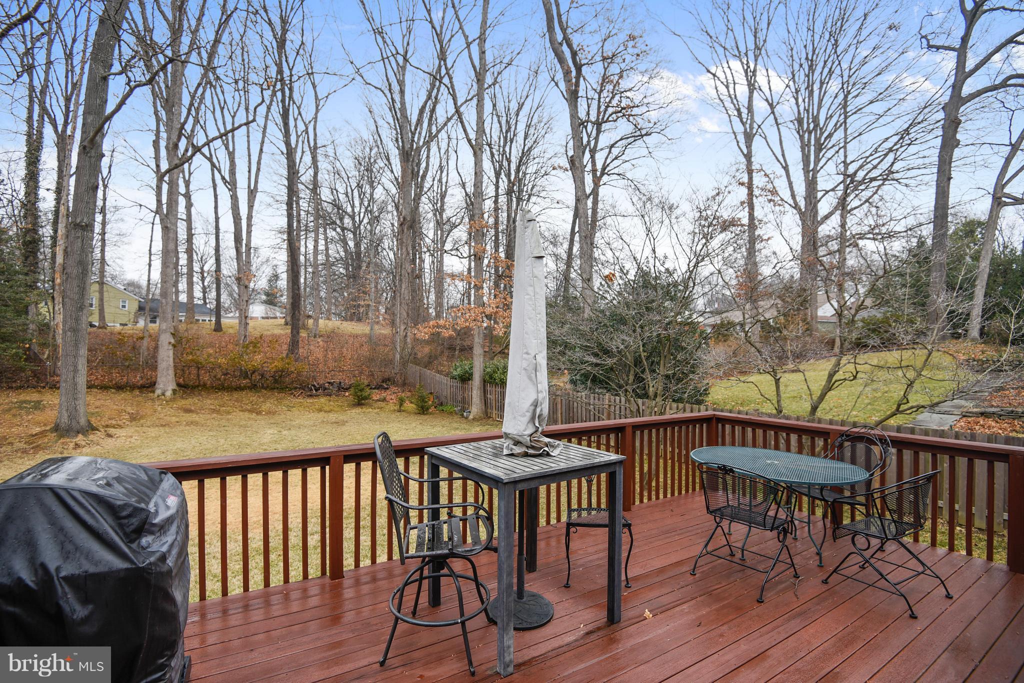 8108 Ellet Road Springfield, VA 22151 - Photo 7 of 21 a view of balcony with wooden floor and outdoor seating