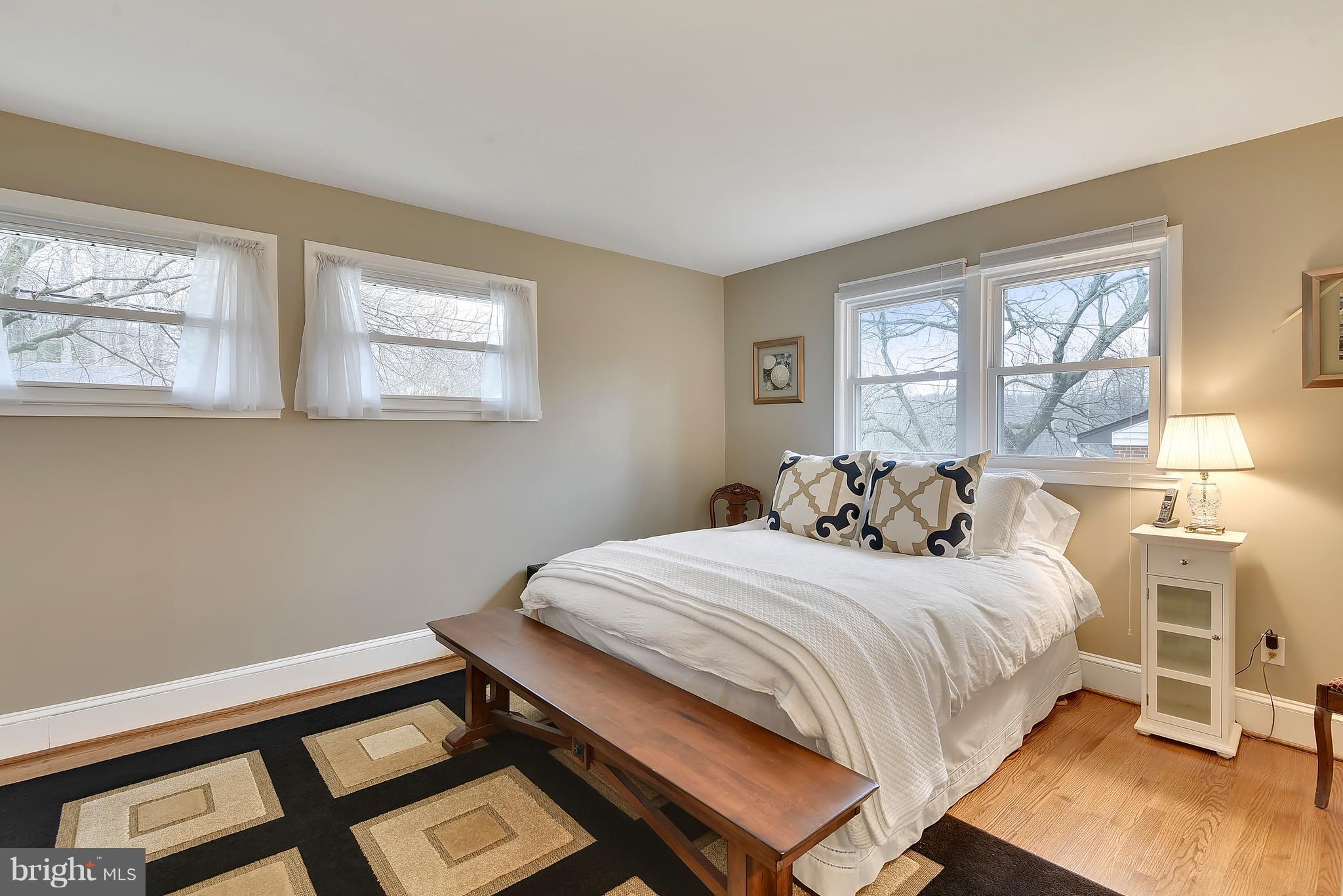 8108 Ellet Road Springfield, VA 22151 - Photo 8 of 21 a bedroom with a bed and a window