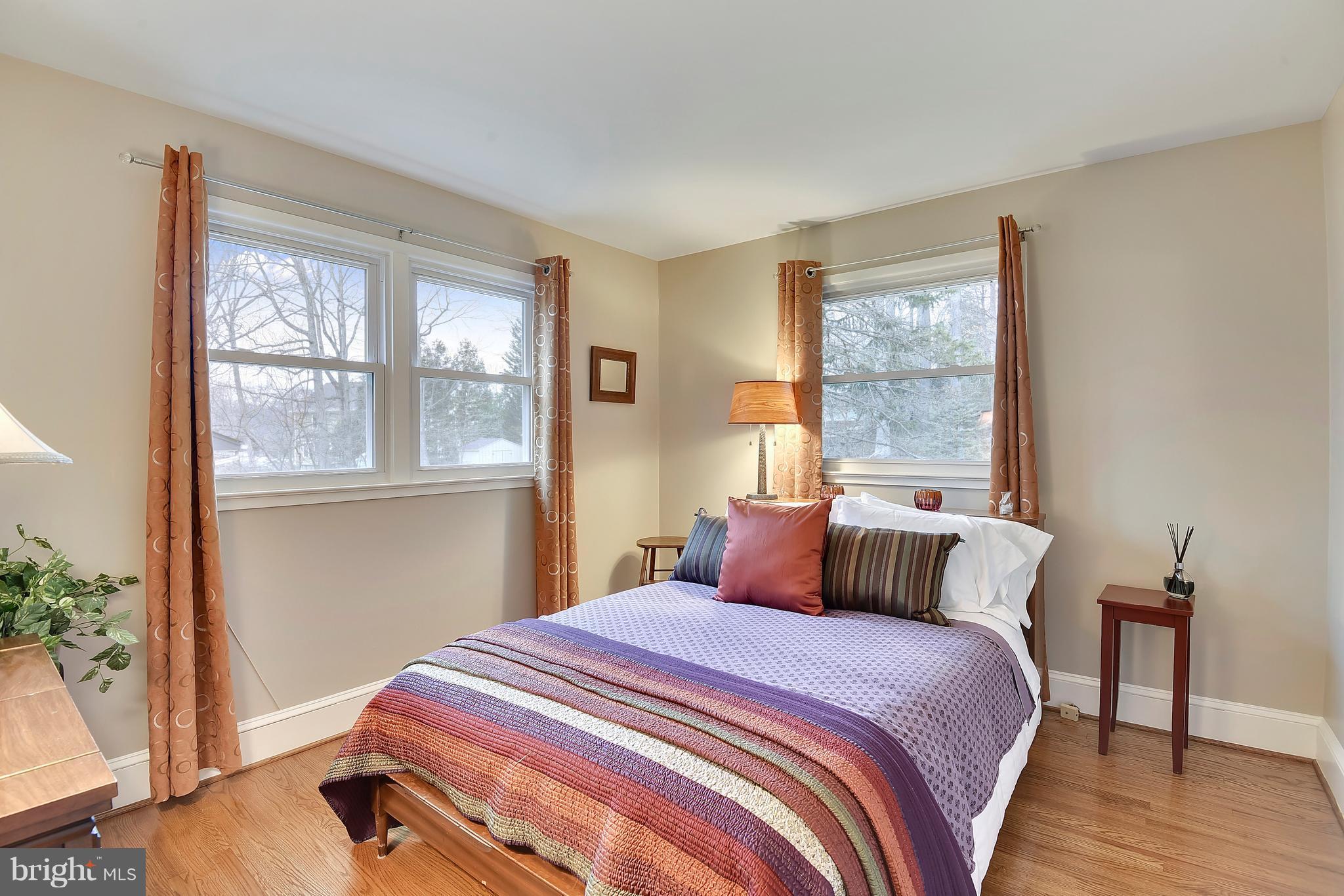 8108 Ellet Road Springfield, VA 22151 - Photo 10 of 21 a bedroom with a bed and a window