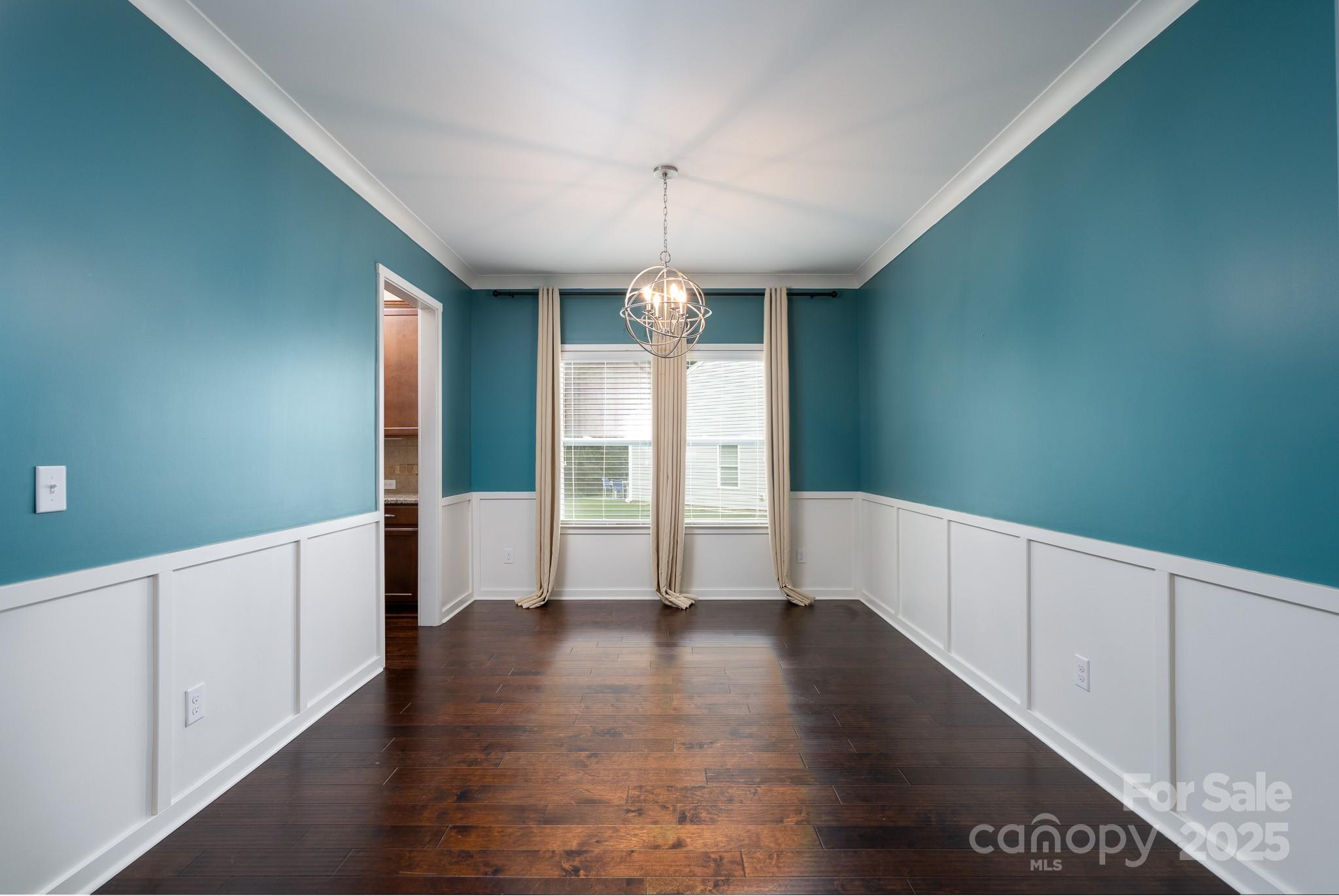 2496 Bergamot Street, Unit 61 Tega Cay, SC 29708 - Photo 16 of 43 a view of an entryway with wooden floor