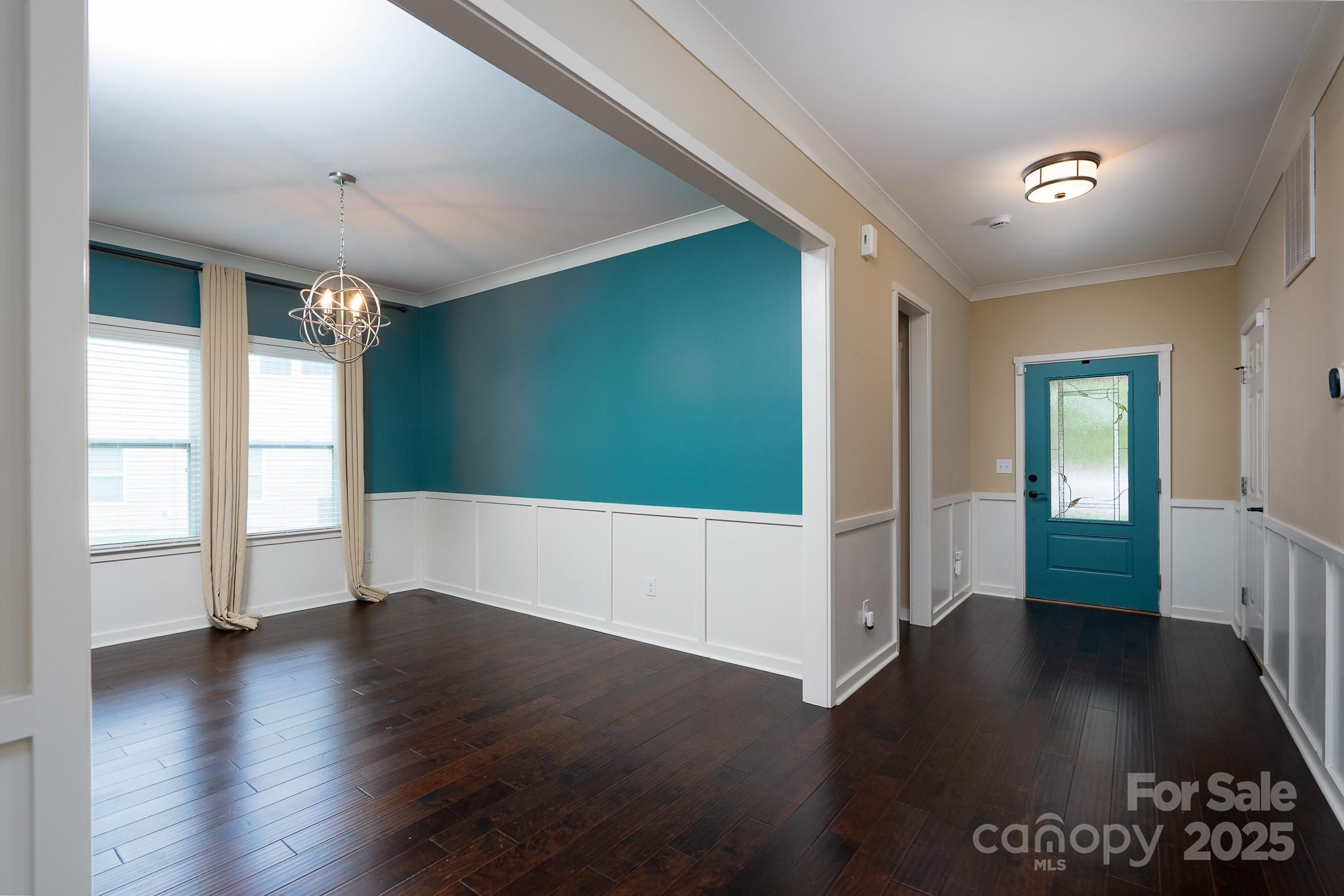 2496 Bergamot Street, Unit 61 Tega Cay, SC 29708 - Photo 17 of 43 a view of livingroom with hardwood floor and window