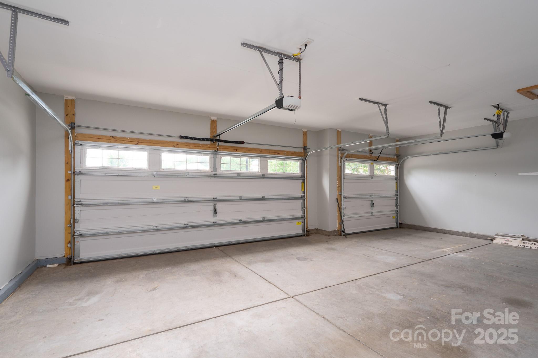2496 Bergamot Street, Unit 61 Tega Cay, SC 29708 - Photo 30 of 43 a view of a garage room