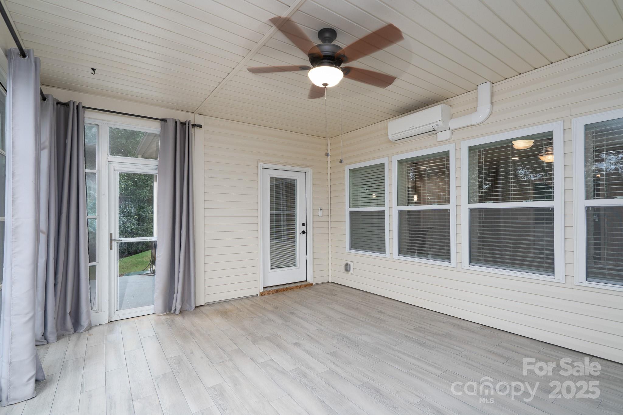 2496 Bergamot Street, Unit 61 Tega Cay, SC 29708 - Photo 32 of 43 a view of an entryway of a house