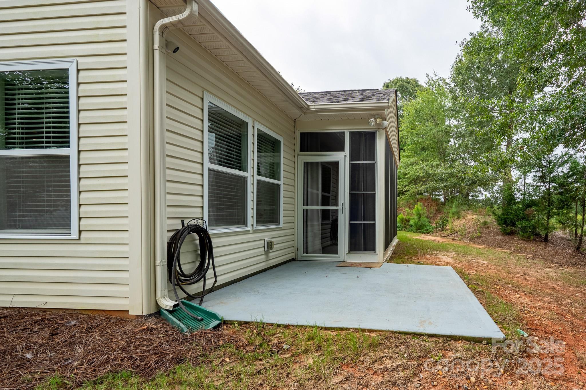 2496 Bergamot Street, Unit 61 Tega Cay, SC 29708 - Photo 34 of 43 a front view of a house with a yard