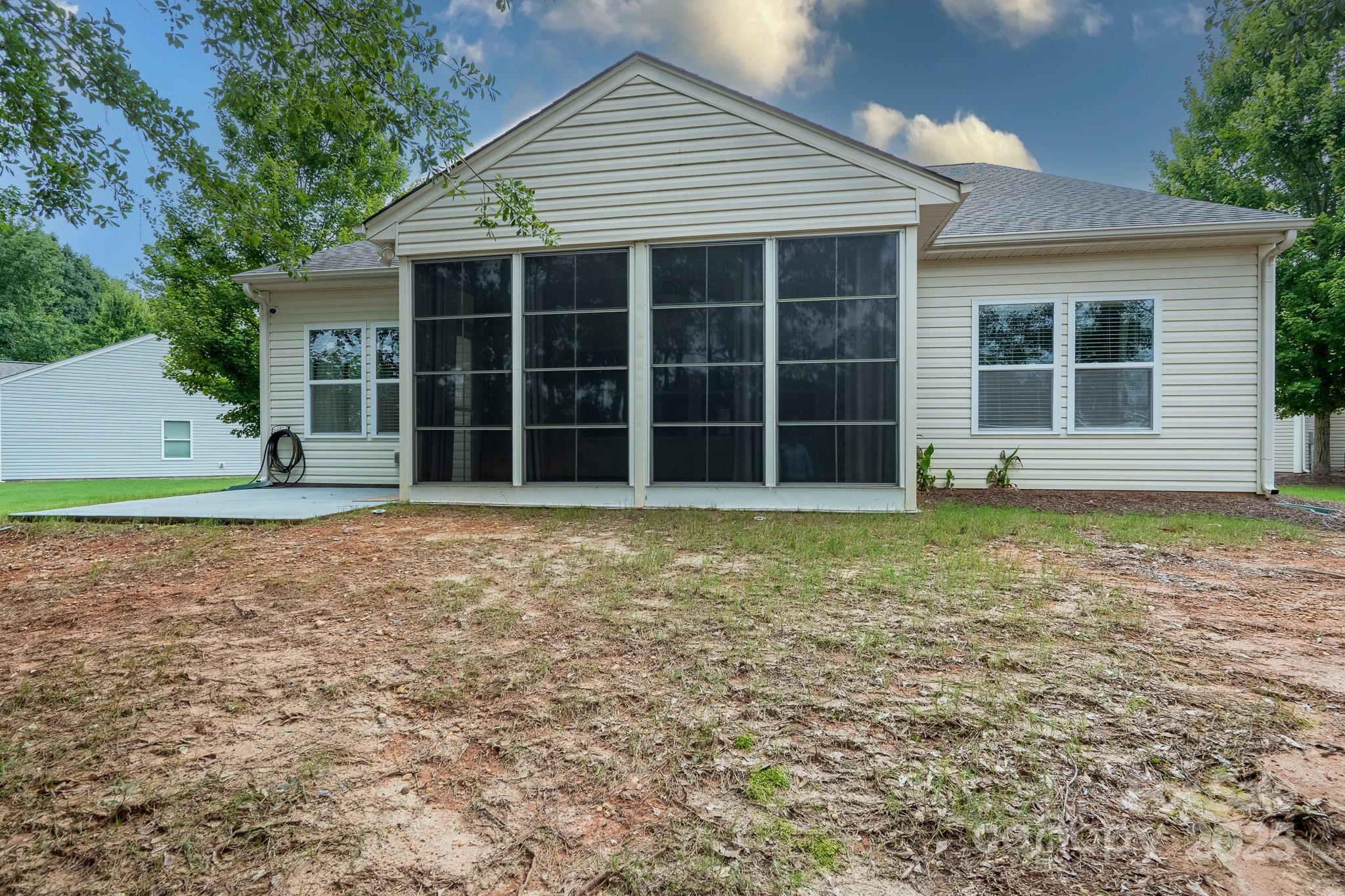 2496 Bergamot Street, Unit 61 Tega Cay, SC 29708 - Photo 37 of 43 a house with white door